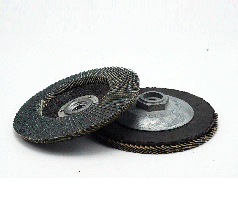Flap disc with alloyed hub backing